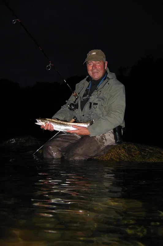 In the dark - Henning had problems keeping in balance while fly fishing from the rocks so he finally hauled out a spinning rod and sat down on a stone and fished -- and caught fish.